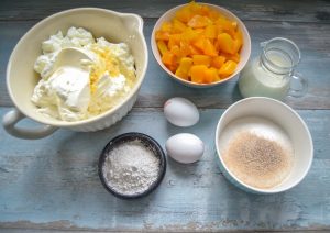 Zutaten Quarkcreme, Quark, Schmand, Eier, Zucker, Sahne und Pfirsich