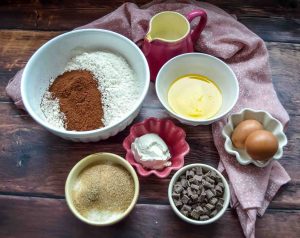 Zutaten Muffins Mehl, Kakao, Butter, Schokodrops, Eier, Öl und Zucker